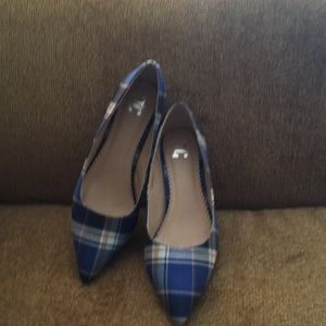 Size 6 kitten heal shoe with a blue plaid motif.